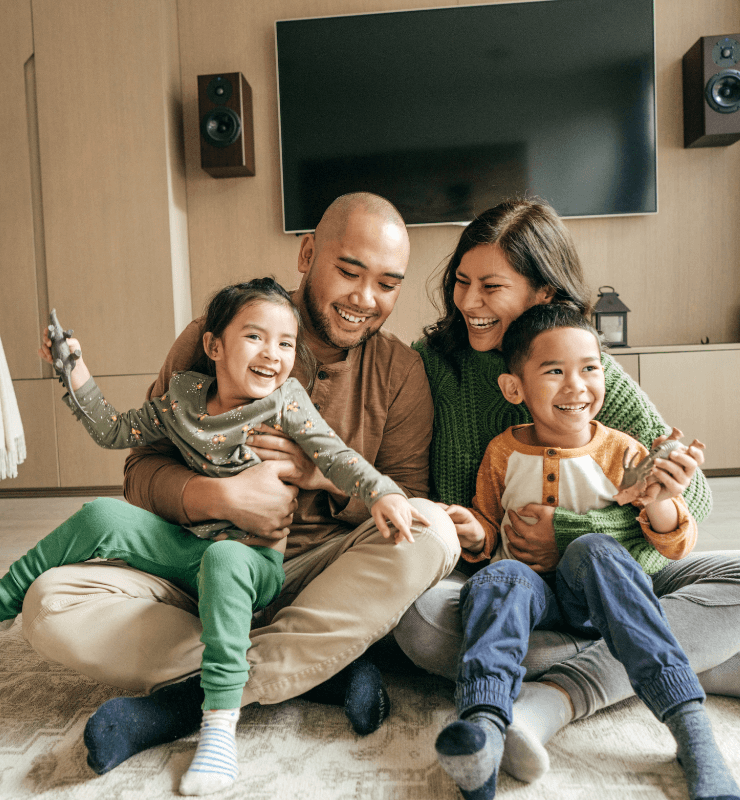 family relaxing in a cleaned home